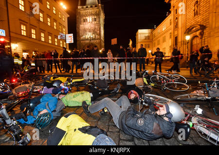 Prague, Czech Republic. 11th Dec, 2017. Auto*Mat group organize a happening, in protest at restrictions of cycling along cycle paths in centre of Prague, at Krizovnicke Square, Prague, Czech Republic, on Monday, December 11, 2017. Credit: Vit Simanek/CTK Photo/Alamy Live News Stock Photo