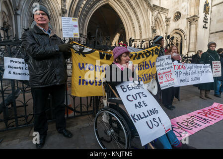 December 12, 2017 - London, UK. 12th December 2017. A lunchtime vigil by Mental Health Resistance Network, Winvisible (women with visible & invisible disabilities) and DPAC (Disabled People Against Cuts) supported the case of RF, who contends that the way people experiencing psychological distress are treated by new Personal Independence Payment (PIP) rules is unfair and discriminatory, being held at the High Court. Changes to the rules made in March 2017 by the Dept of Work & Pensions mean that those with serious mental health conditions who are unable to plan or undertake a journey because o Stock Photo