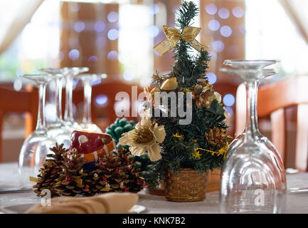 Table setting with Christmas decorations in a restaurant. Stock Photo