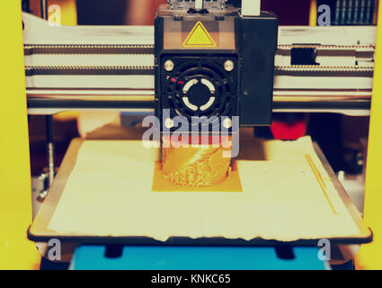 Close up of printing machine during printing a piece of plastic Stock Photo