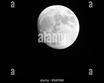 An almost full moon with craters well visualized Stock Photo