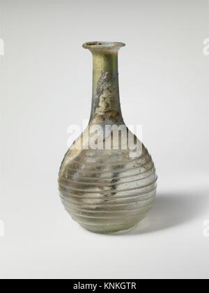 Glass perfume bottle. Period: Early Imperial; Date: 1st century A.D; Culture: Roman; Medium: Glass; blown and trailed; Dimensions: H.: 4 5/8 x 2 1/2