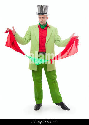 Funny magician in a green suit on a white background Stock Photo