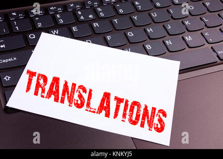 Writing Translations text made in the office close-up on laptop computer keyboard. Business concept for  Translate Explain Plead Book Language Worksho Stock Photo
