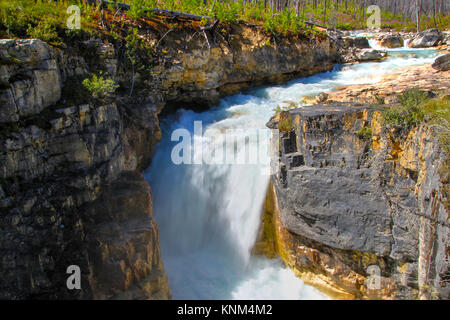 Roaring waterfall from Tokumm Creek at Marble Canyon hike in Kootenay National Park, British Columbia, Canada, near Banff. Stock Photo