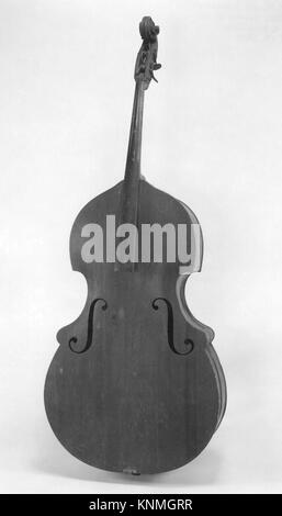 Big String Instruments Bass A bass viol, a large stringed instrument of the 17th century, featuring ...