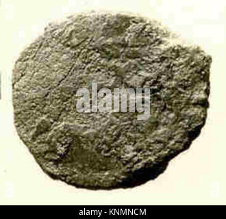 An ancient coin showing inscriptions and symbols, illustrating the ...