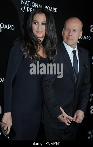 NEW YORK, NY - JANUARY 06: Emma Heming-Willis, Bruce Willis attends the 2014 National Board of Review Gala at Cipriani 42nd Street on January 6, 2015 in New York City.    People:  Emma Heming-Willis, Bruce Willis Stock Photo