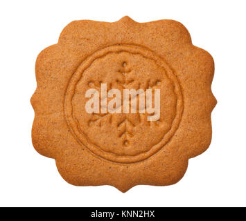 Gingerbread cookie in shape of label with snowflake isolated on white background. Top view Stock Photo