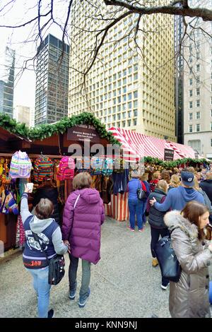 Chicago, Illinois, USA. The Christkindlmarket features European and international vendors who display hand-crafted ornaments, toys and gifts. Stock Photo