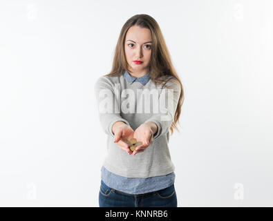 Woman hands holding euro coins and giving them to camera Stock Photo