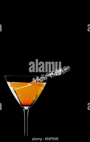 close up shot of orange drink in martini glass Stock Photo