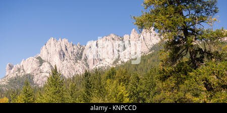 Hard rock good for climbing juts from the ground in California at Castle Crags Stock Photo