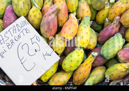 Prickly pears of the variety called bastardoni on the table of a street seller in Catania, Italy. Stock Photo