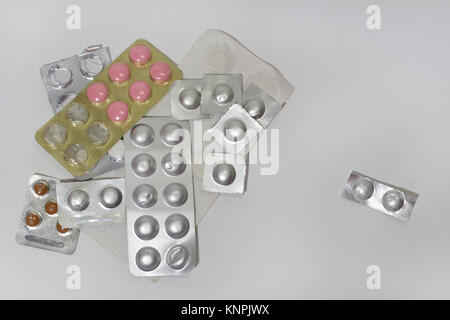 packaging medicinal tablets in packages. Empty and pristine, trimmed and whole Stock Photo