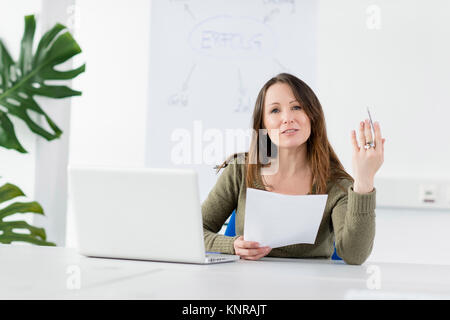 Frau im Buero - woman in office Stock Photo