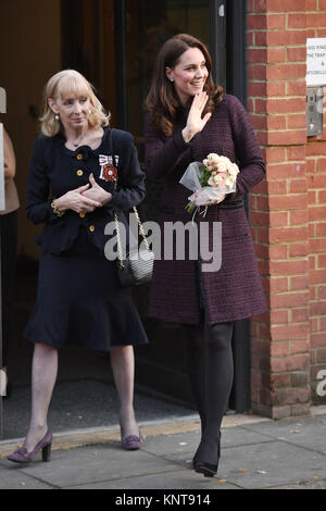 The Duchess of Cambridge (right) departing the Rugby Portobello Trust community centre in North Kensington, London, where she joined children and families to celebrate the work of the trust. Stock Photo