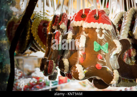 Haanging Bunch of GIngerbread Men Christmas Market Plastic Wrapped Packaged Stock Photo