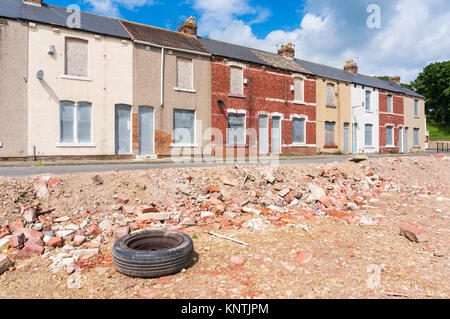 derelict terraced houses England Hartlepool england abandoned houses on building site ready for demolition or redevelopment Hartlepool Stock Photo