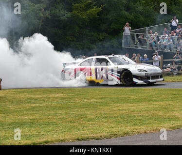 Toyota Camry, tyre smoke, NASCAR, Sprint Cup, Red Bull, 2007,Patrick Friesacher, Goodwood Festival of Speed, 2014, 2007, 2014, Autosport, cars, classi Stock Photo