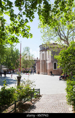 Spring in Venice, Italy  in Campo San Giacomo dell Orio with local Venetians going about their daily life Stock Photo