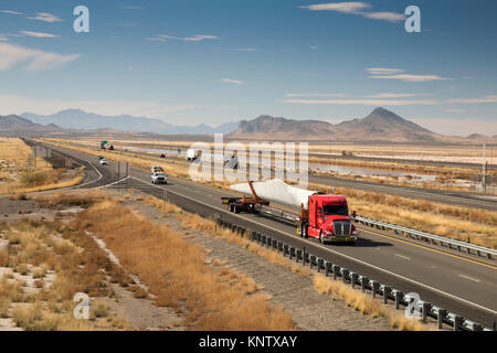 Lordsburg, New Mexico - A truck carries a blade for a wind turbine on Interstate 10. Stock Photo