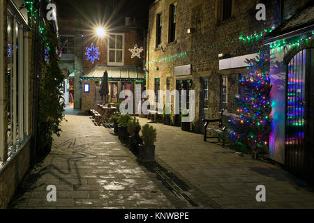 Talbot court with a christmas tree and decorations at night. Stow on the Wold, Cotswolds, Gloucestershire, England Stock Photo