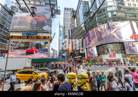 NEW YORK - JUL 22: 42nd Street near Times Square with traffic and commercials on July 22, 2014 in New York. 42nd Street is a major crosstown street kn Stock Photo