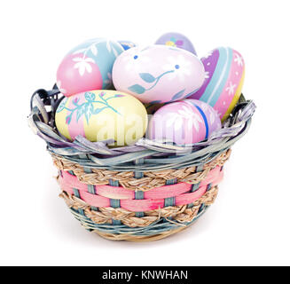 Basket of colorful Easter eggs on a white background Stock Photo