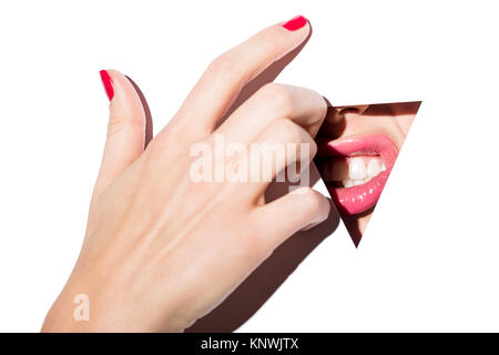 woman lips behind triangle hole Stock Photo - Alamy