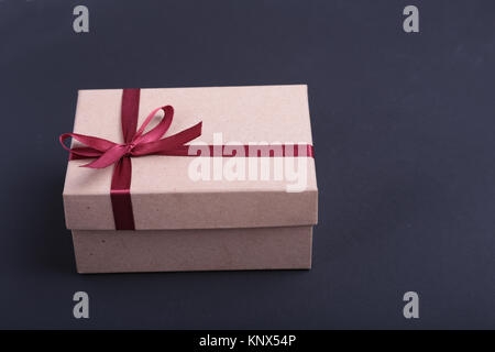 Gift boxes with bow on black background Stock Photo