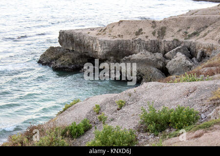 seaside or sea view of Oman beach deep water with rocks beautiful wallpapers and backgrounds Salalah Oman beach in Muscat, sure, Canada, USA, Germany Stock Photo