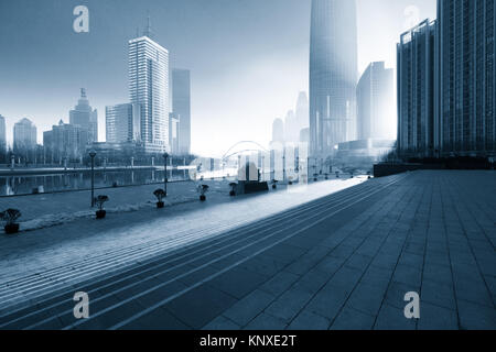 Modern building exterior and empty square floor in city of China. Stock Photo