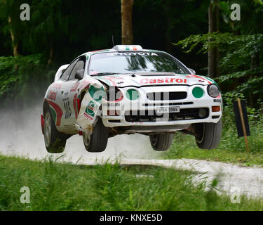 A slight scuff on the front wing, Mark Courtney, Toyota Celica GT-Four ST205, K-AM 9985, Forest rally stage, Goodwood FoS 2015, 2015, Classic, dust, e Stock Photo