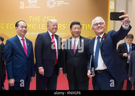 Australian Prime Minister Malcolm Turnbull, right, takes a selfie with Vietnamese Prime Minister Nguyen Xuan Phuc, left, U.S President Donald Trump, center, and Chinese President Xi Jinping during the APEC Leaders Summit November 11, 2017, in Danang, Vietnam. Stock Photo