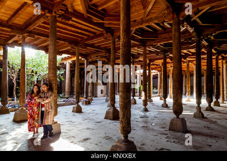 Uzbek People In Traditional Dress In The Juma Mosque, Khiva, Uzbekistan Stock Photo