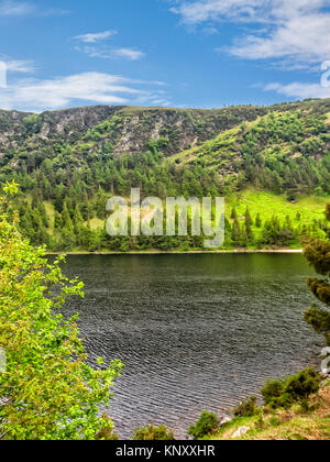 Mountain lake near Glendalough, Co. Wicklow, Ireland. Glendalough is an early Christian monastic settlement  founded by St. Kevin in the 6th century. Stock Photo