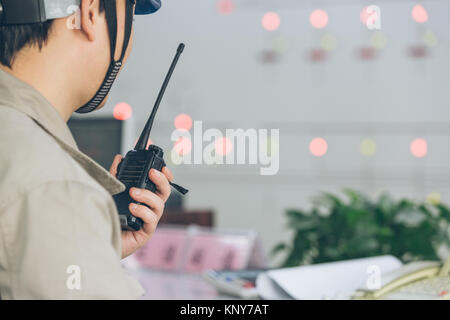 workers in control room of a factory. Stock Photo