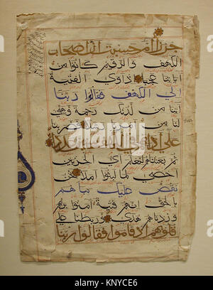 A folio from a Qur'an manuscript at the Metropolitan Museum, featuring ...