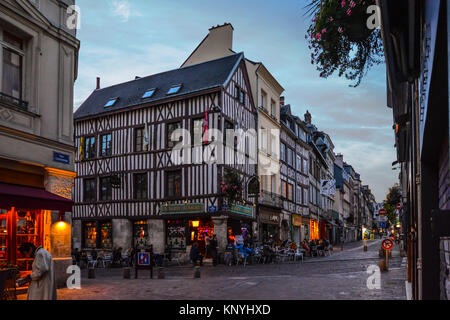 A quaint half timbered cafe with outdoor patio on the Rue du Horloge in the old town center of Rouen France near the Normandy Coast Stock Photo