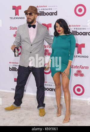 MIAMI, FL - APRIL 30:  Don Dinero and Luna Star arrives at 2015 Billboard Latin Music Awards presented by State Farm on Telemundo at Bank United Center on April 30, 2015 in Miami, Florida   People:  Don Dinero and Luna Star Stock Photo