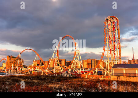 Brooklyn, New York - Dec 10, 2017: Thunderbolt Rollercoaster in Coney Island, Brooklyn, New York City at sunset. Stock Photo