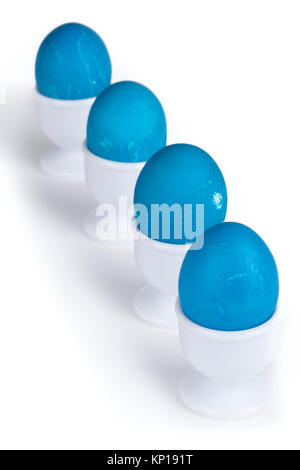 in lined blue eggs on a white cup Stock Photo