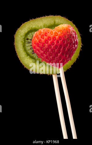 kiwi and strawberry on the stick Stock Photo