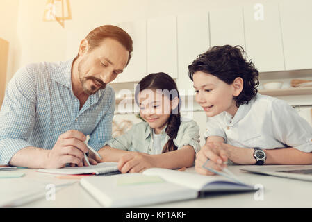 Smart nice man explain geometry Stock Photo
