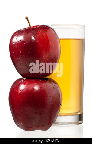 stack of apples and juice glass Stock Photo