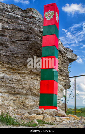 Border post on the frontier with the emblem of the Russia Stock Photo