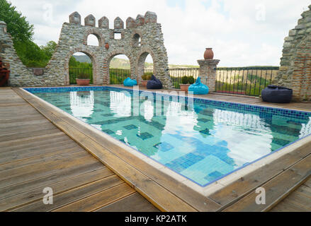 Empty pool in modern hotel Stock Photo