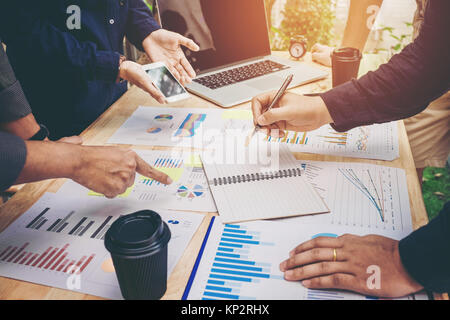 Startup business team colleagues meeting Planning Strategy Analysis discussing new plan financial on graph data new business project Stock Photo