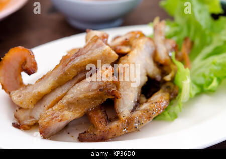 Grill pork neck on white plate. Stock Photo